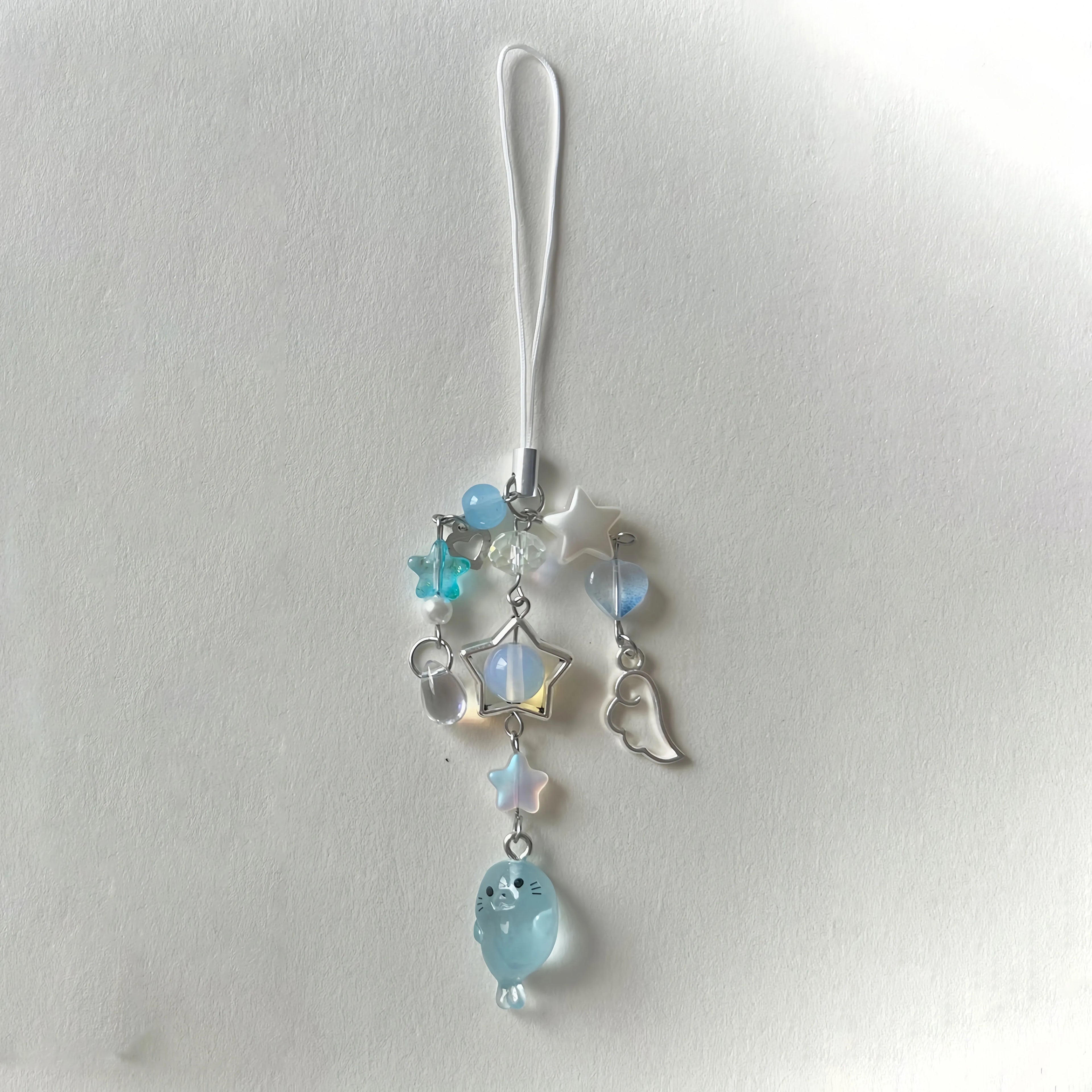 ˚ ‧₊˚ seal phone charms . ݁ ˖